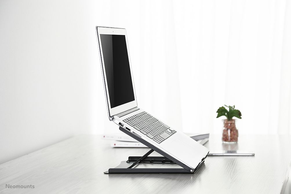 Neomounts by Newstar NSLS075BLACK Foldable Laptop Stand - Black  Specifications General Min. screen size*: 10 inch Max. screen size*: 15 inch Min. weight: 0 kg Max. weight: 5 kg Desk mount: Stand  Functionality Type: Tilt Width: 25,5 cm Depth: 25,5 cm Height: 3,5 cm Height adjustment: Manual_9